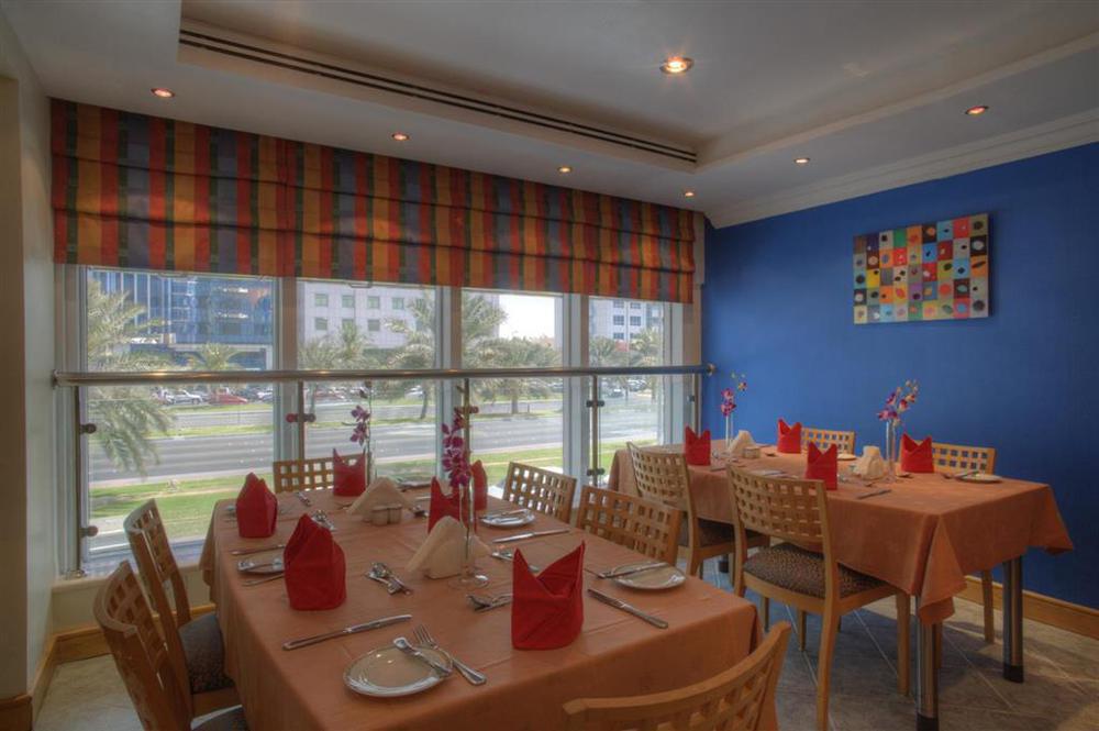 أبو ظبي Al Diar Palm Hotel Apartments المطعم الصورة